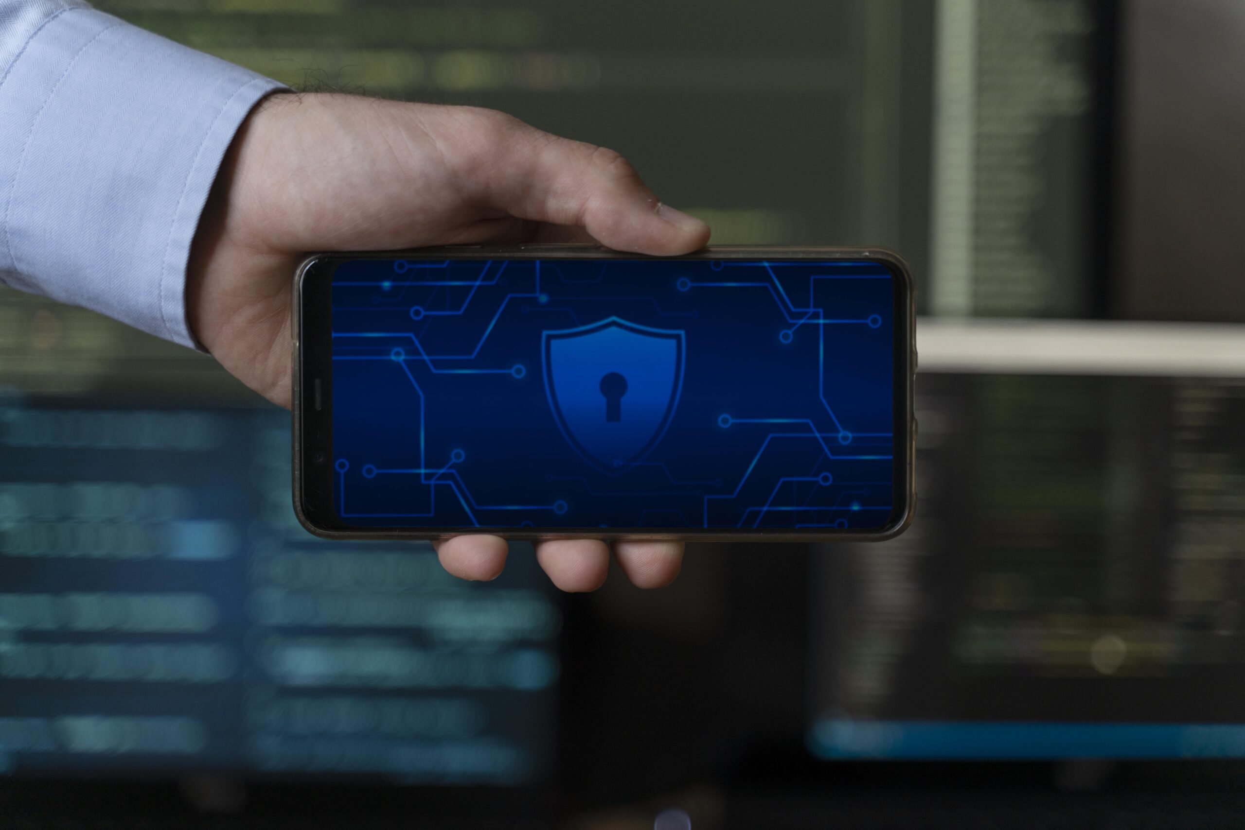 man holding a secured phone